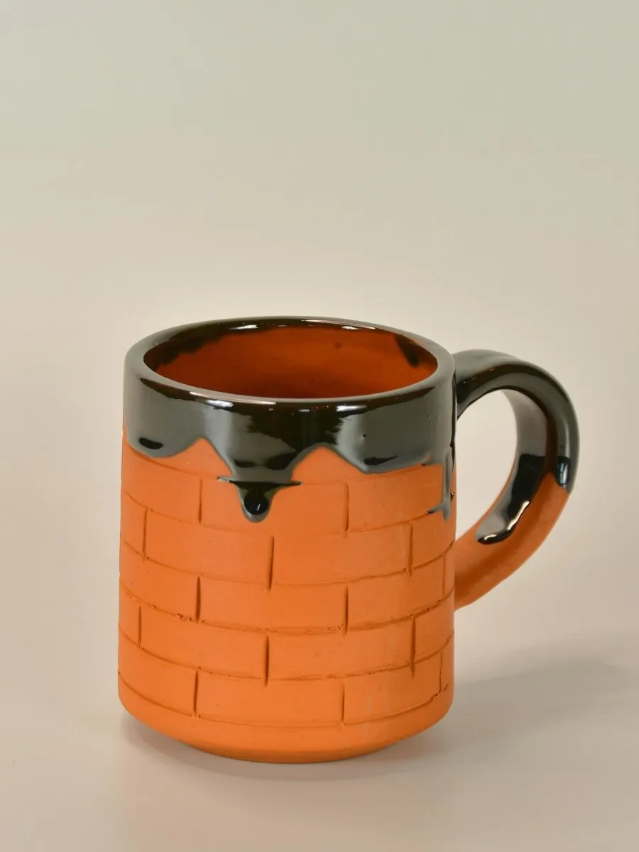 Sculpted Terracotta Coffee Mug: Stylish Functionality