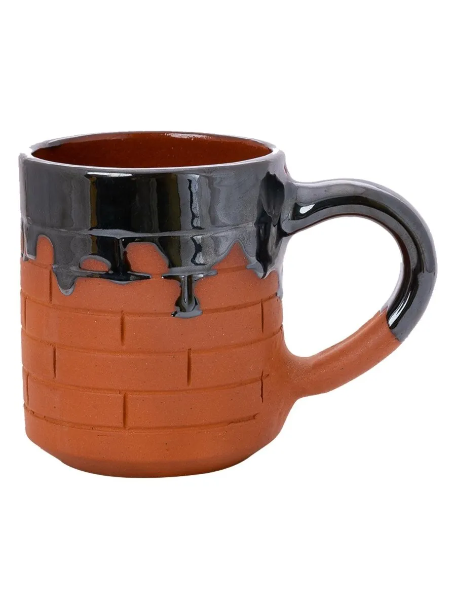 Sculpted Terracotta Coffee Mug: Stylish Functionality